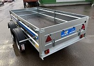 Прицеп Кремень стандарт плюс двухосный 3,0*1,56А см с бортом 31 с тентом 120 см