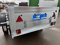 Прицеп Кремень стандарт плюс двухосный 3,0*1,56А см с бортом 50 с тентом 100 см