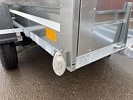 Прицеп Кремень стандарт плюс двухосный 3,0*1,56А см с бортом 31 с тентом 120 см